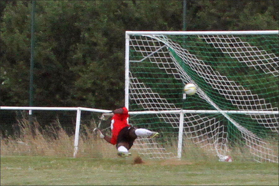 Noyes shot hits the net giving the Colney keeper no chance