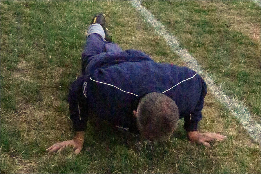 Crawley Green's RAF Manager in a press up head to head with Jets RAF coach James Hall