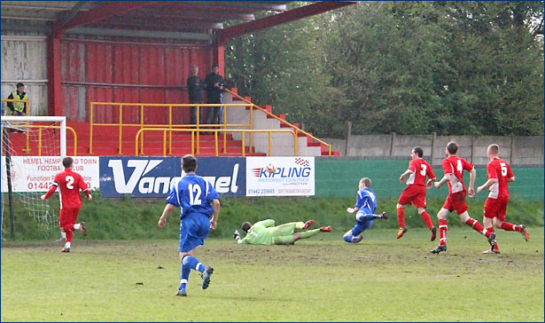 Lewis Putman goes close with the Hemel defence chasing back